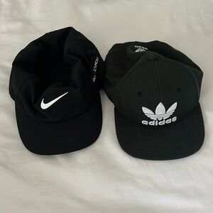 2 hats, one nike and one adidas